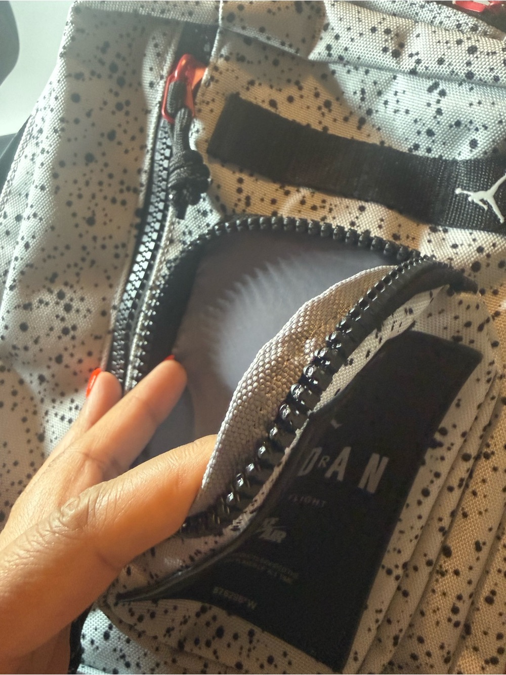 Jordan Speckled Sling Bag - White with Black and Red Accents - Picture 4 of 8